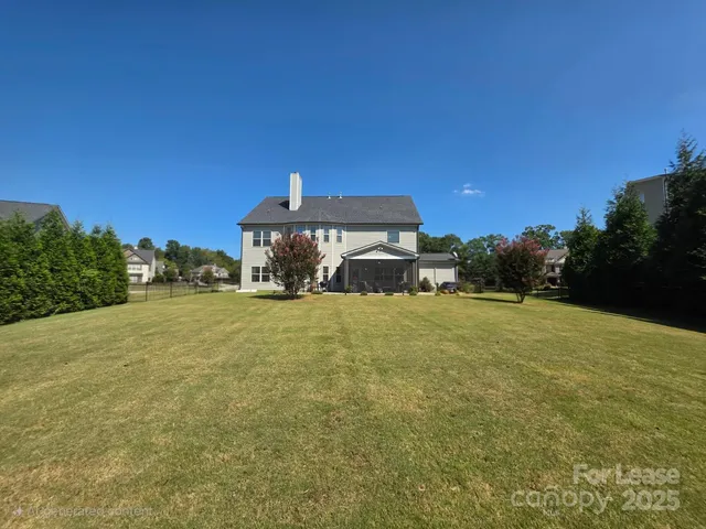 a living room with a couch and a window