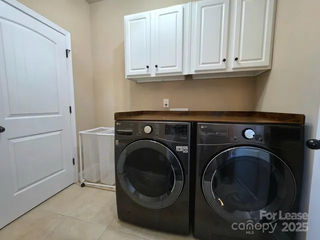 a view of an empty room with a fireplace
