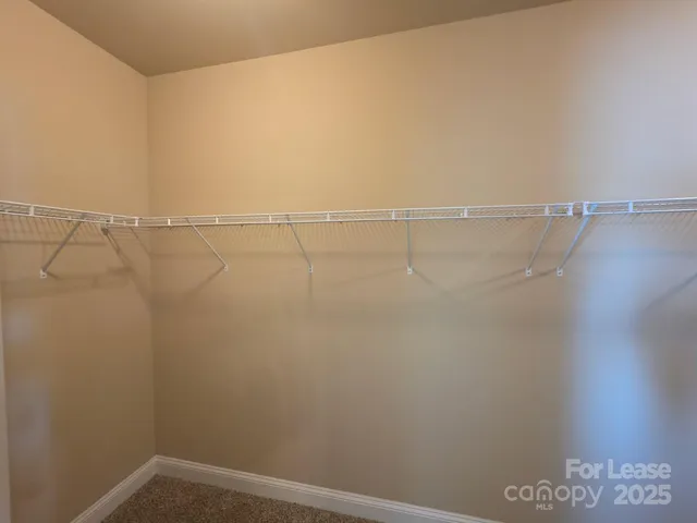 a view of bathroom with dual sinks