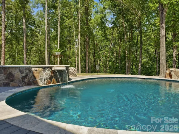 a view of outdoor space with swimming pool