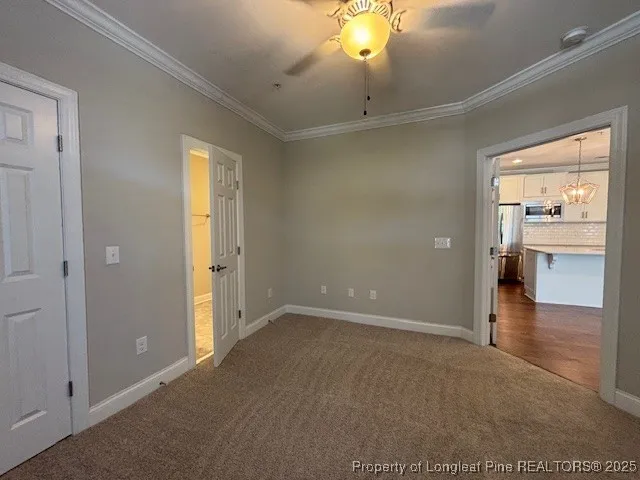 an empty room with fan