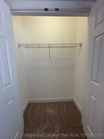 a view of a walk in closet