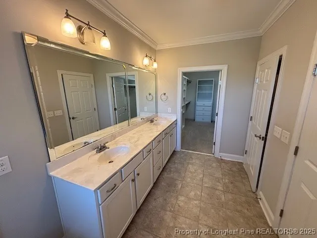 a bathroom with a sink and mirror