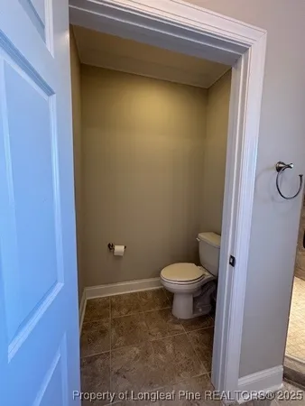 a bathroom with a toilet