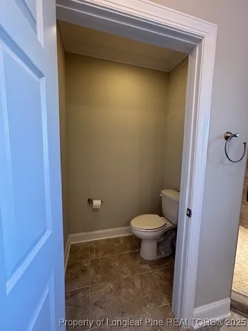 a bathroom with a toilet