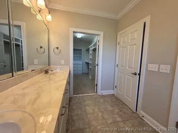 wooden floor in a en suite bathroom