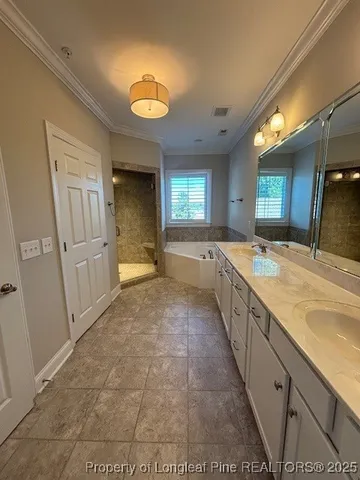 a large bathroom with a sink and a large mirror