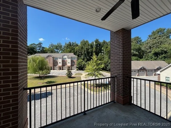 a view of a balcony with a swing