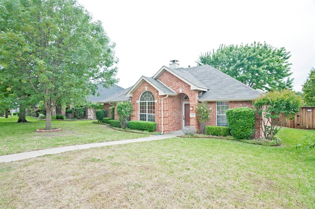 7757 Lancelot Road Frisco, TX 75035 - Photo 2 of 27 View of front of home featuring fence, a chimney, a front yard, brick siding, and a shingled roof