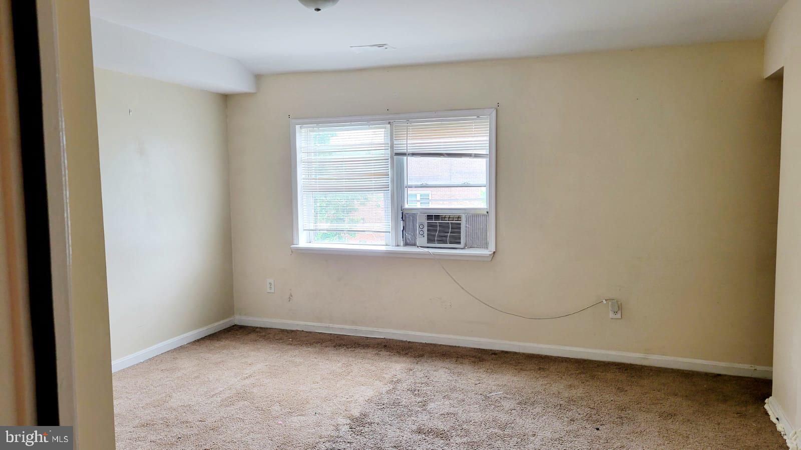 1712 Capitol Avenue Northeast Washington, DC 20002 - Photo 12 of 15 an empty room with a window