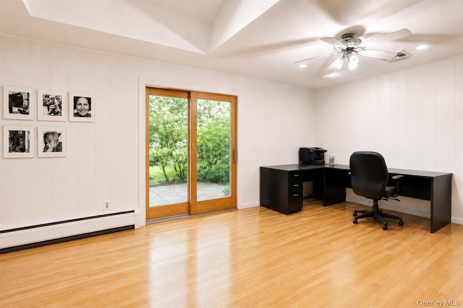 8 Swallow Avenue Spring Valley, NY 10977 - Photo 11 of 28 a view of a workspace with furniture and a window