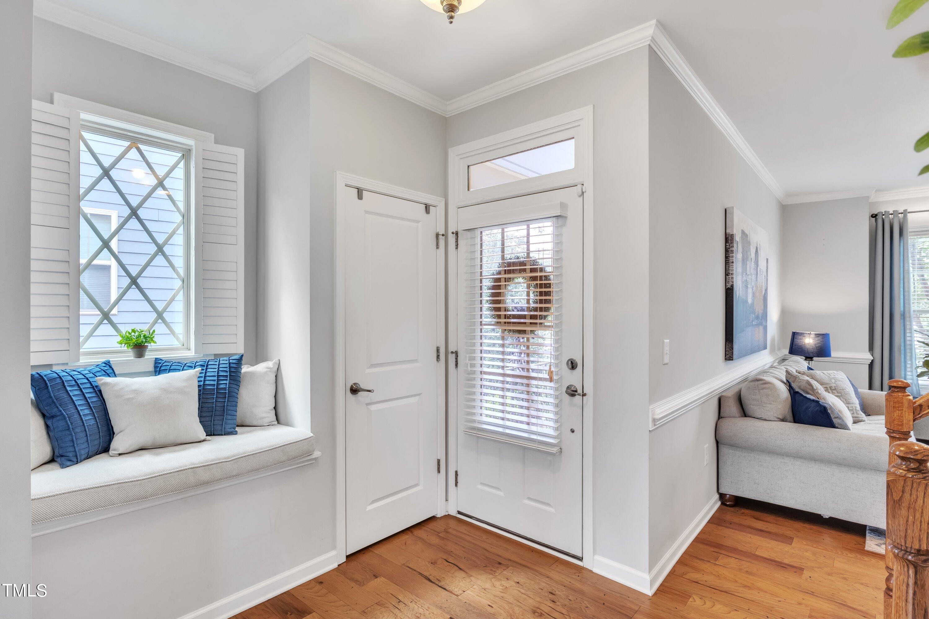 844 Wildflower Ridge Road Wake Forest, NC 27587 - Photo 4 of 66 a living room with furniture and a window