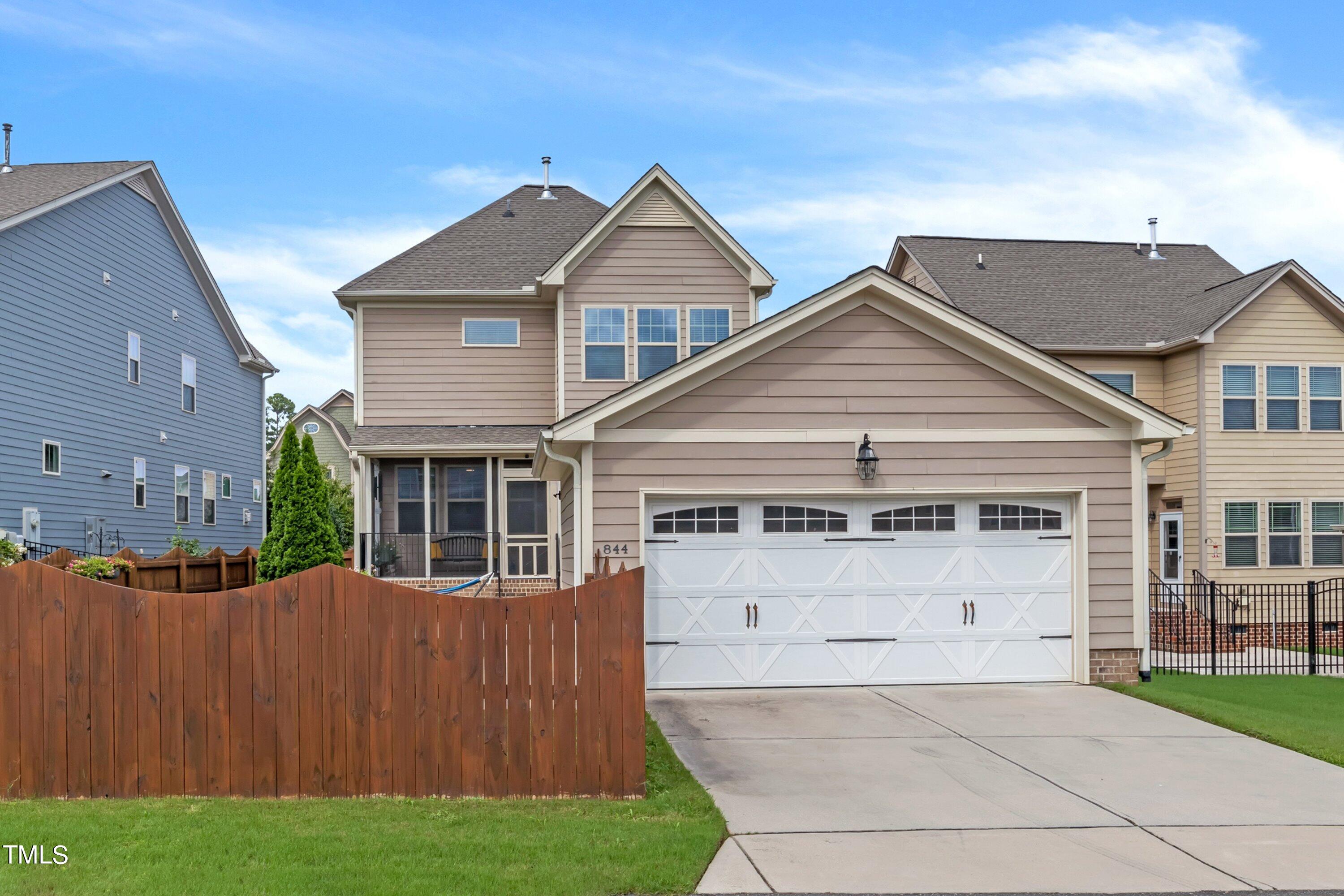 844 Wildflower Ridge Road Wake Forest, NC 27587 - Photo 51 of 66 a view of a house with a yard