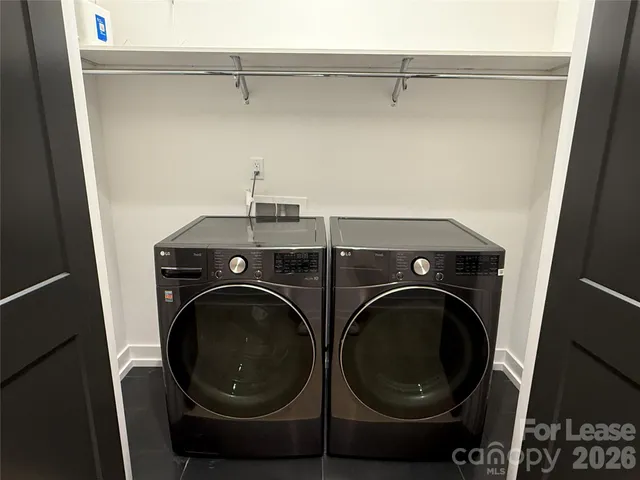 a view of a backyard with large trees