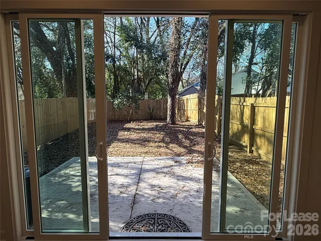 a view of a glass door and porch