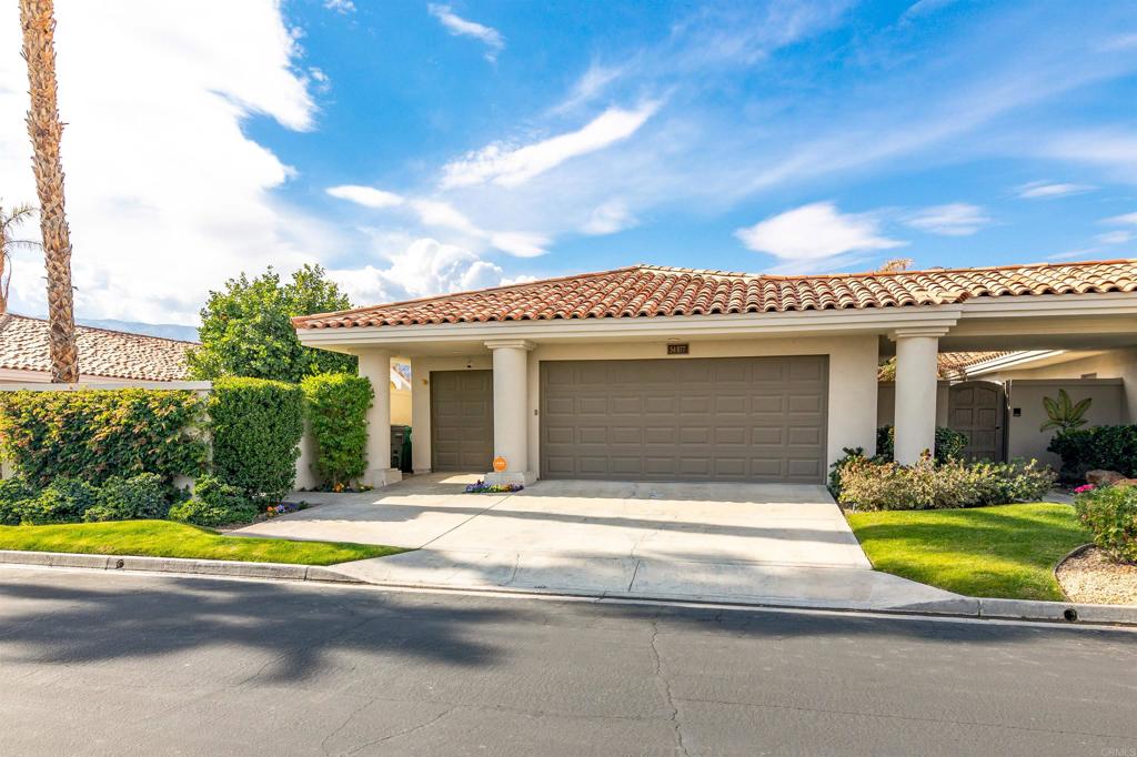54877 Inverness Way La Quinta, CA 92253 - Photo 3 of 60 a view of a house with swimming pool and sitting area