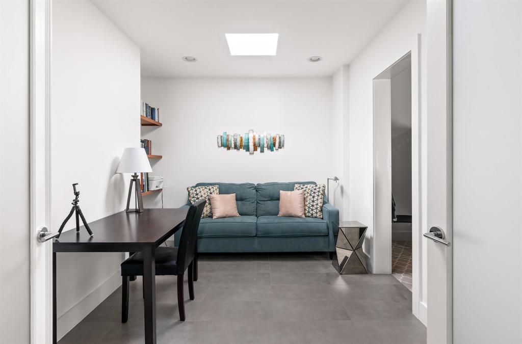 54877 Inverness Way La Quinta, CA 92253 - Photo 37 of 60 a living room with furniture and a table