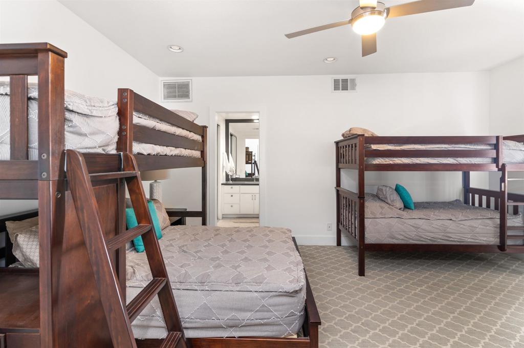 54877 Inverness Way La Quinta, CA 92253 - Photo 38 of 60 a bedroom with furniture and a window