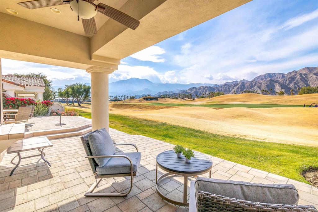 54877 Inverness Way La Quinta, CA 92253 - Photo 45 of 60 a view of a swimming pool with an ocean view