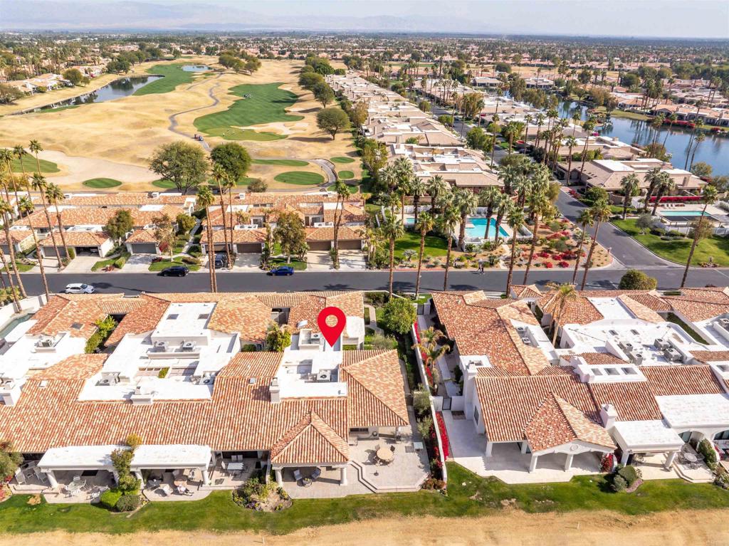 54877 Inverness Way La Quinta, CA 92253 - Photo 50 of 60 an aerial view of residential houses with outdoor space