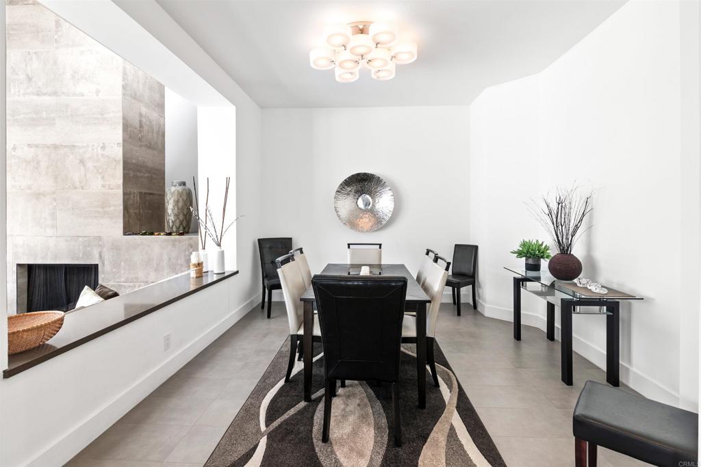 54877 Inverness Way La Quinta, CA 92253 - Photo 10 of 60 a view of a dining room with furniture and chandelier