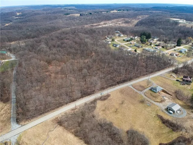 a view of a backyard of a house