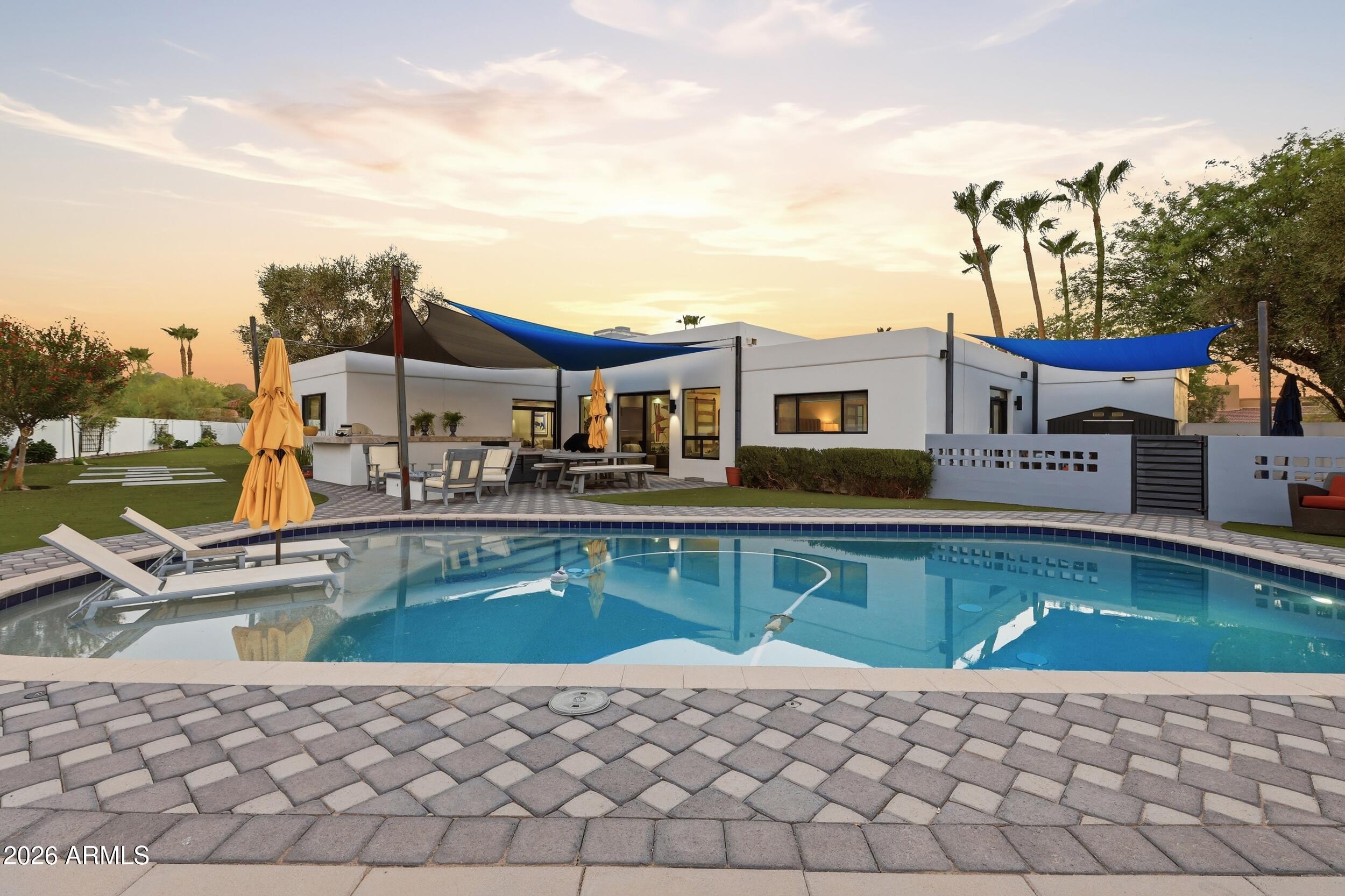 4417 East Mountain View Road Phoenix, AZ 85028 - Photo 28 of 41 a house with river in front of it