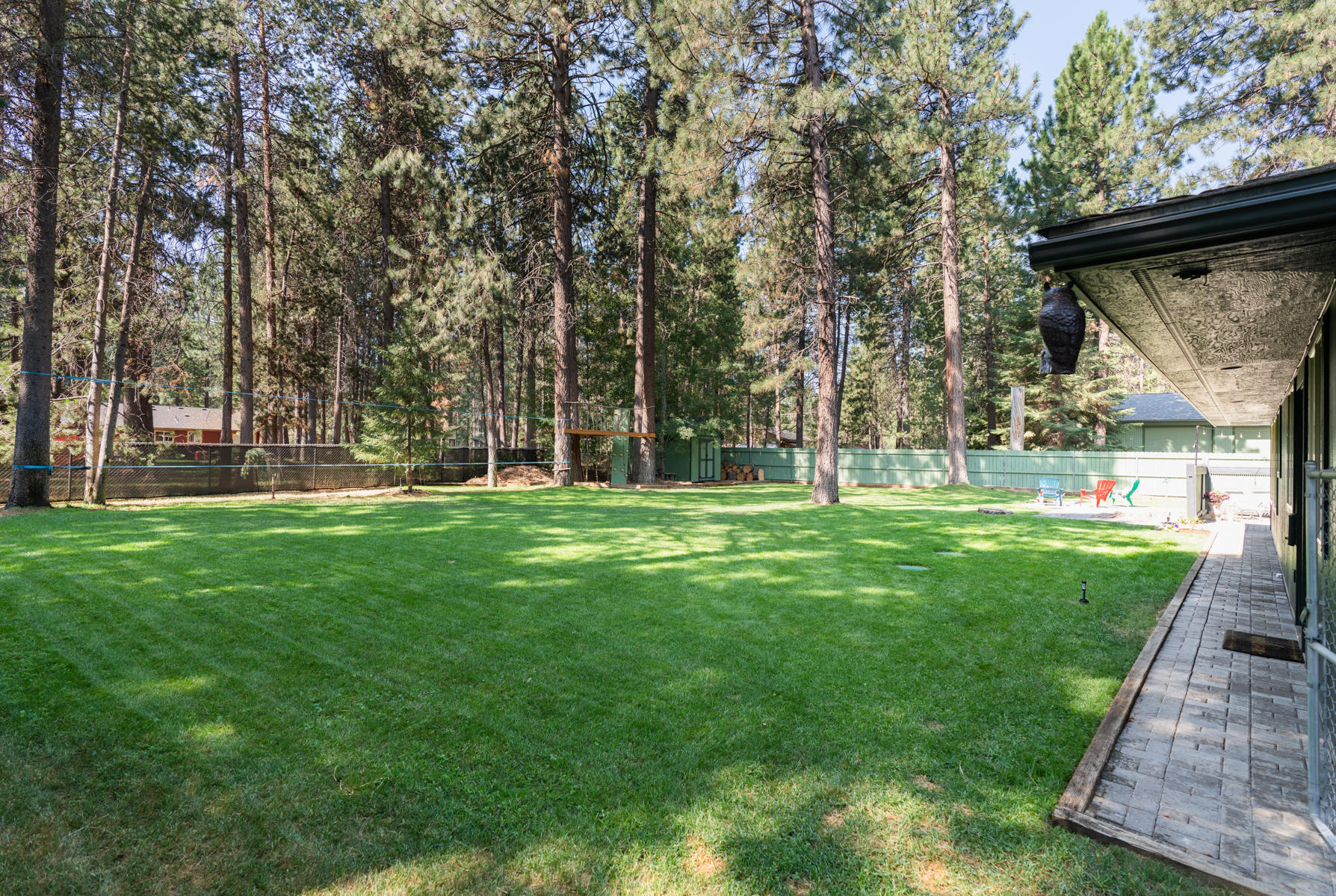 17039 Spring River Road Bend, OR 97707 - Photo 22 of 28 Nice big, open and flat rear yard ready for play or just relaxing.
