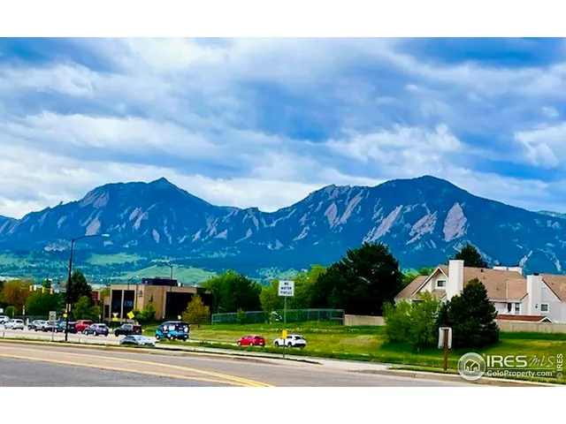 a view of street with houses