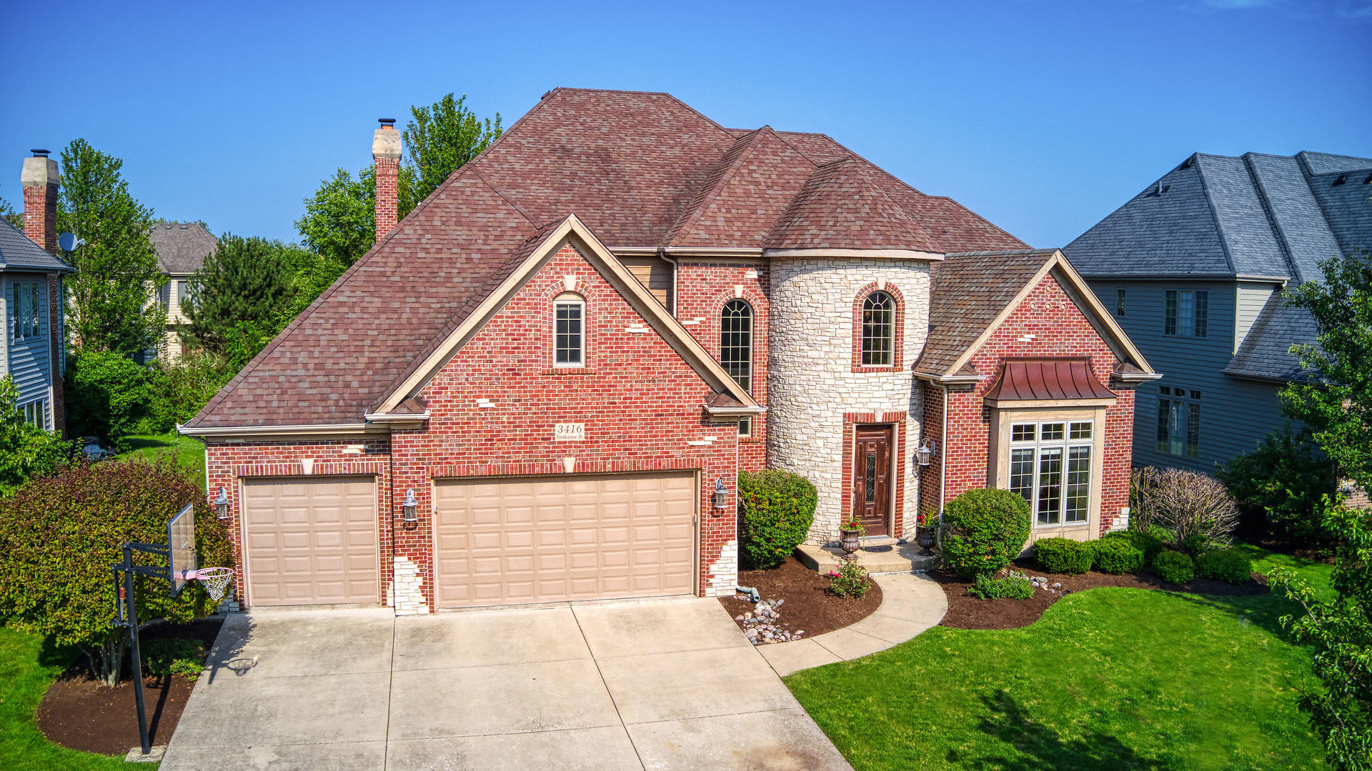3416 Frankstowne Drive Naperville, IL 60565 - Photo 2 of 41 a front view of a house with garden