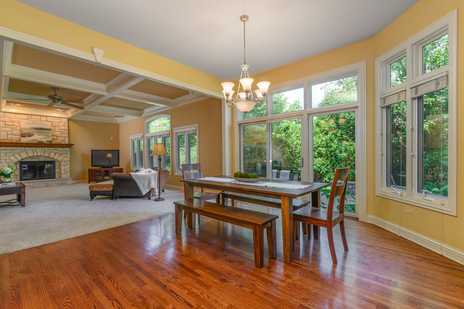 3416 Frankstowne Drive Naperville, IL 60565 - Photo 14 of 41 a view of a dining room with furniture window and wooden floor