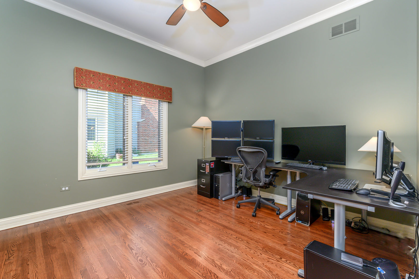 3416 Frankstowne Drive Naperville, IL 60565 - Photo 17 of 41 a view of a workspace with furniture and a window