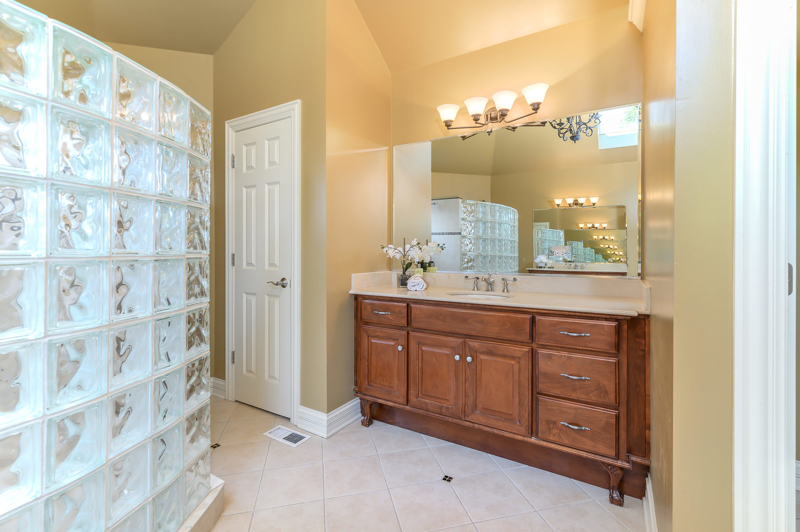 3416 Frankstowne Drive Naperville, IL 60565 - Photo 24 of 41 a bathroom with a sink and a mirror