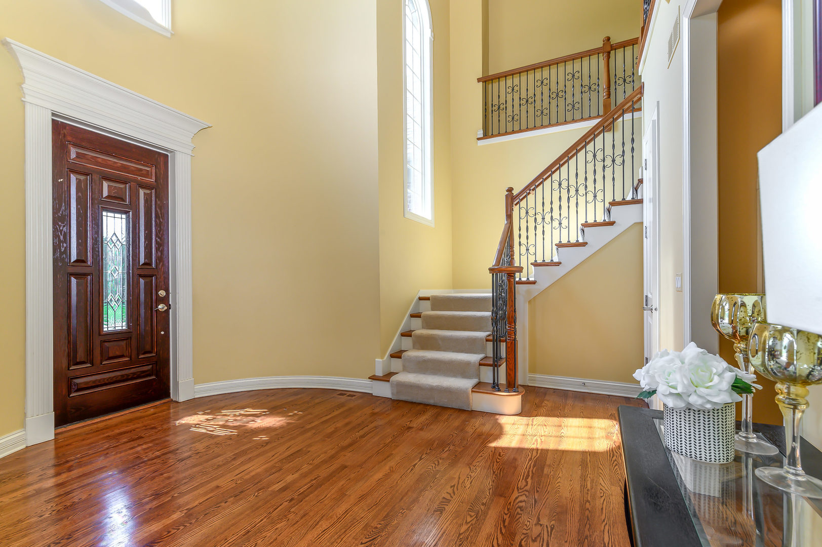 3416 Frankstowne Drive Naperville, IL 60565 - Photo 5 of 41 a view of entryway and hall with wooden floor