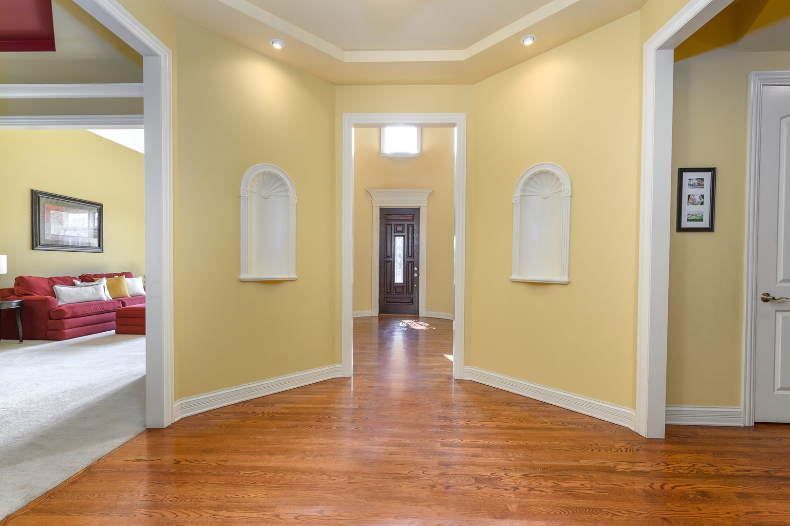 3416 Frankstowne Drive Naperville, IL 60565 - Photo 6 of 41 a view of livingroom with hardwood floor and hallway