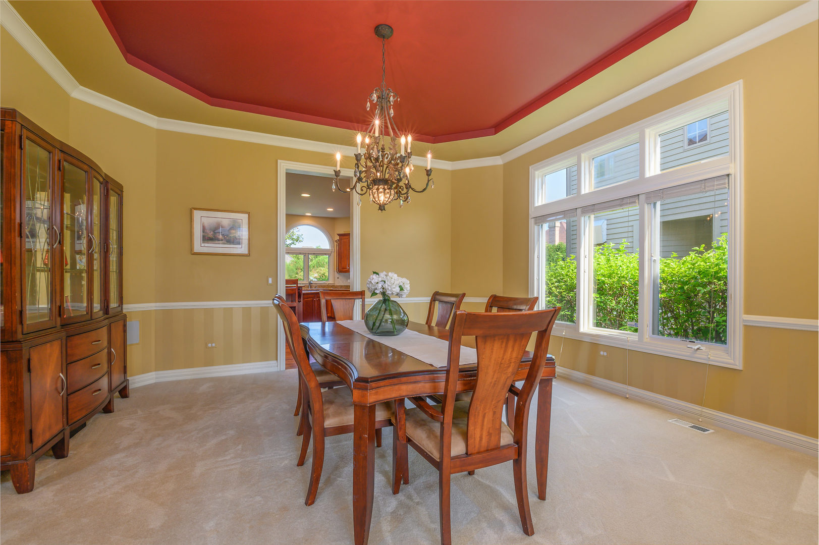 3416 Frankstowne Drive Naperville, IL 60565 - Photo 9 of 41 a dining room with furniture a chandelier and window