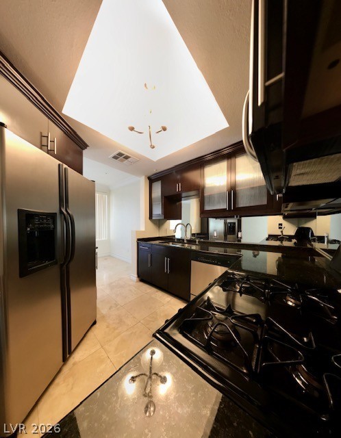 270 East Flamingo Road, Unit 336 Las Vegas, NV 89169 - Photo 3 of 11 This spacious kitchen offers a sleek design with ample counter space and modern appliances.