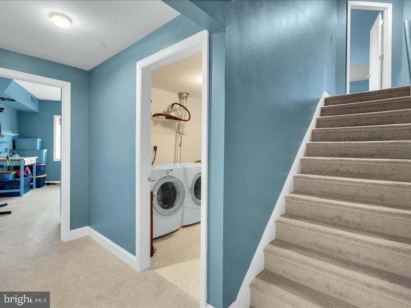 2 Canals End Road, Unit 305 Bristol, PA 19007 - Photo 19 of 22 a view of a hallway with wooden floor and staircase
