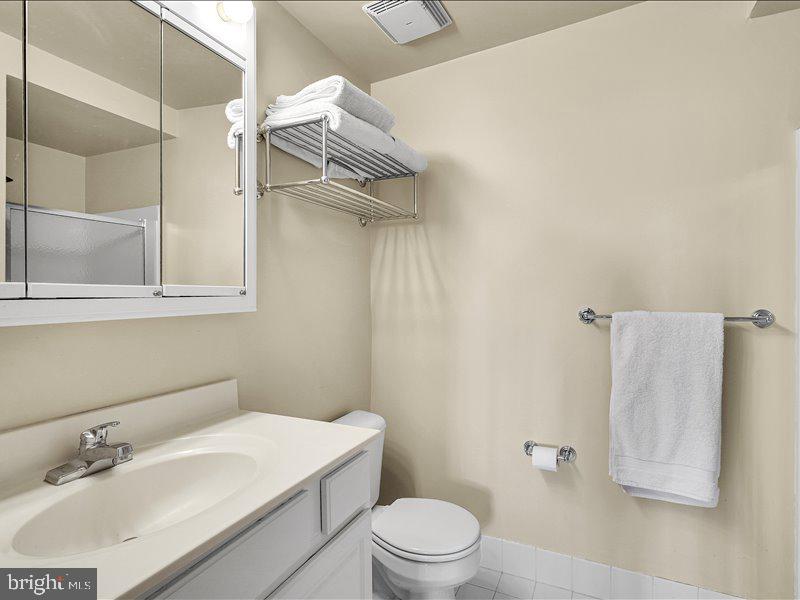 2 Canals End Road, Unit 305 Bristol, PA 19007 - Photo 22 of 22 a bathroom with a sink toilet and shower