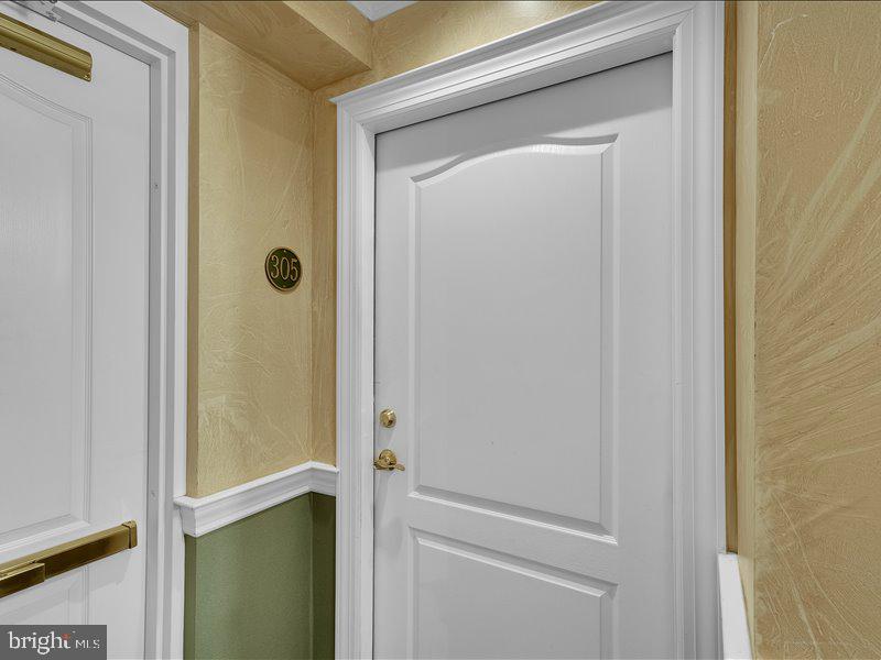2 Canals End Road, Unit 305 Bristol, PA 19007 - Photo 4 of 22 a bathroom with a glass shower door