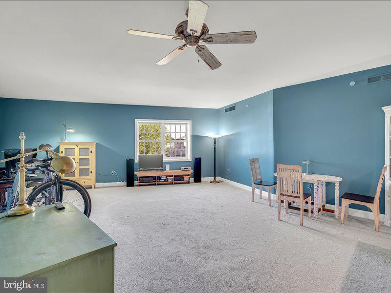 2 Canals End Road, Unit 305 Bristol, PA 19007 - Photo 6 of 22 a view of a livingroom with furniture and a chair