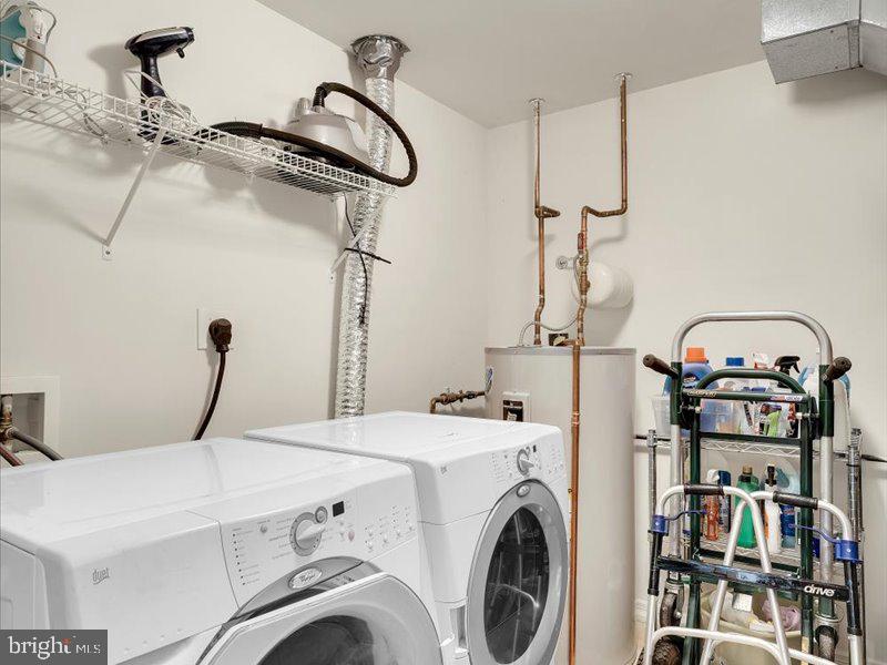 2 Canals End Road, Unit 305 Bristol, PA 19007 - Photo 7 of 22 a utility room with dryer and washer