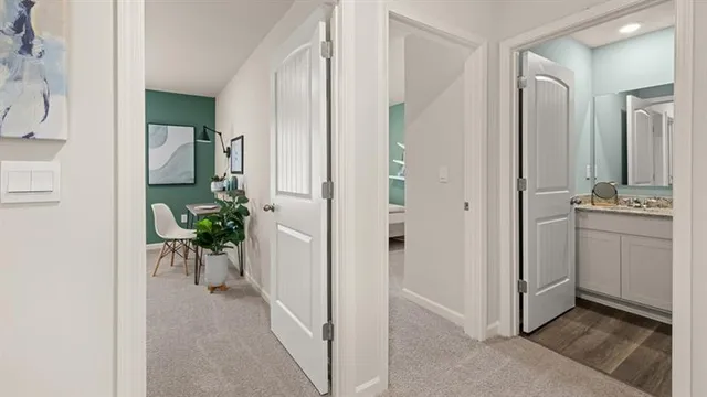 a bedroom with furniture and a potted plant
