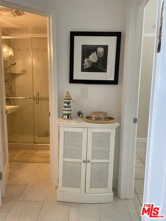 a bathroom with a tub and shower