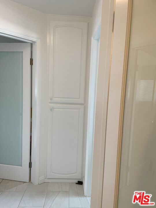 4975 Sandyland Road, Unit 212 Carpinteria, CA 93013 - Photo 18 of 18 a hallway with a door