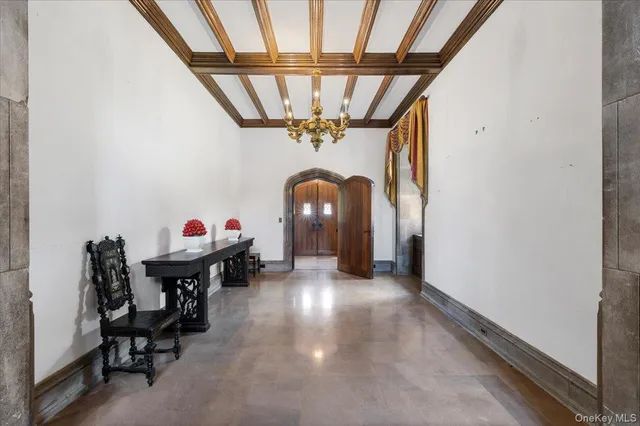 a view of entryway with wooden floor and stairs