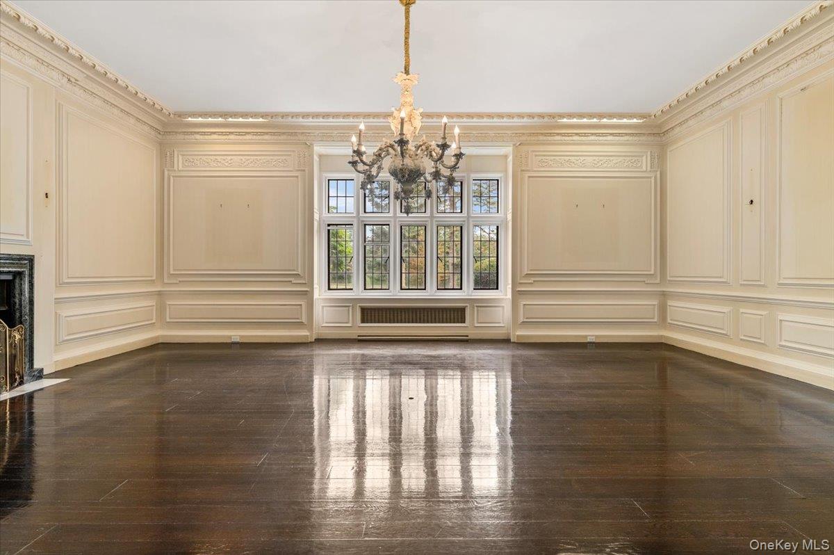 127 Horseshoe Road Mill Neck, NY 11765 - Photo 21 of 48 a view of a room with wooden floor and windows