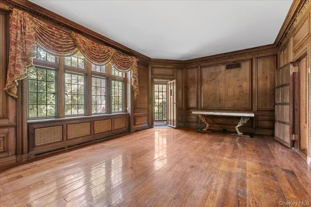 a kitchen with granite countertop a refrigerator and a sink