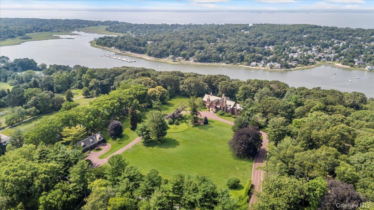 127 Horseshoe Road Mill Neck, NY 11765 - Photo 10 of 48 a view of a lake with a city