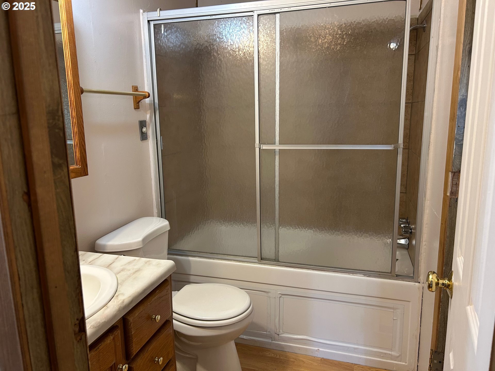 89510 Highway 101, Unit 23 Florence, OR 97439 - Photo 15 of 28 a bathroom with a sink and a mirror
